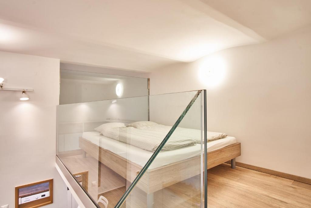 Posteľ alebo postele v izbe v ubytovaní V27 Apartment | hostAID