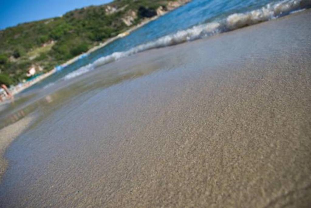 an aerial view of a beach with the water at Hotel Baia Imperiale in Campo nell'Elba