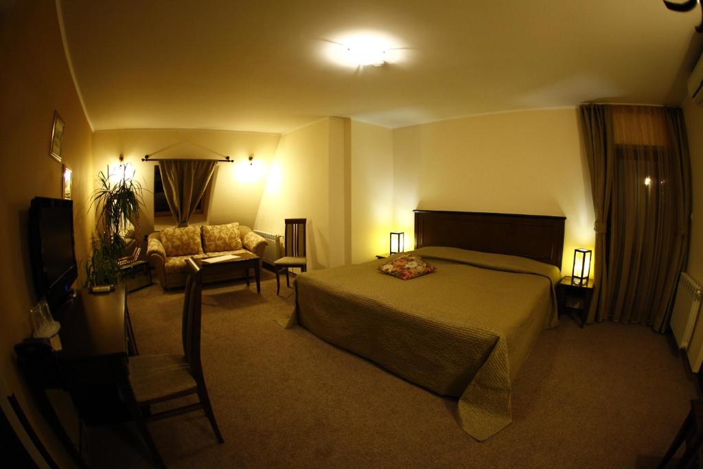 Postel nebo postele na pokoji v ubytování Hi Boutique Hotel