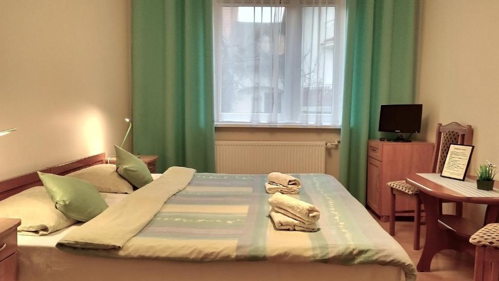 Postel nebo postele na pokoji v ubytování Pod Jarzębiną