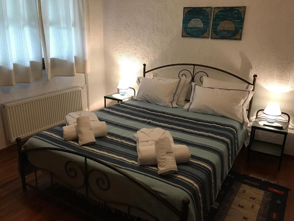 Posteľ alebo postele v izbe v ubytovaní Villa Kazantzakis