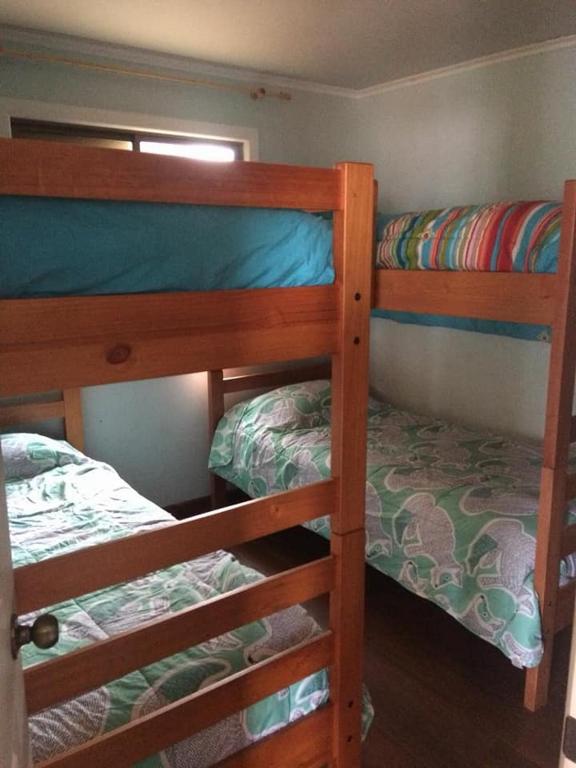Postel nebo postele na pokoji v ubytování Cabañas Don Dago