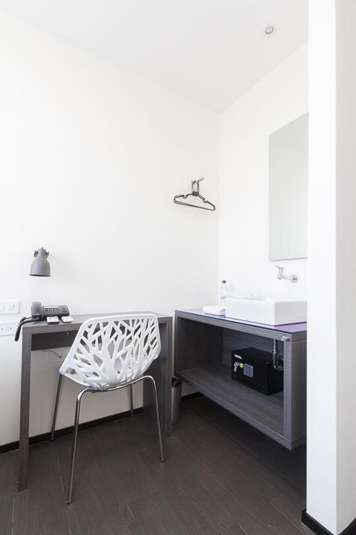 Kuchyň nebo kuchyňský kout v ubytování YU! Smarthotels