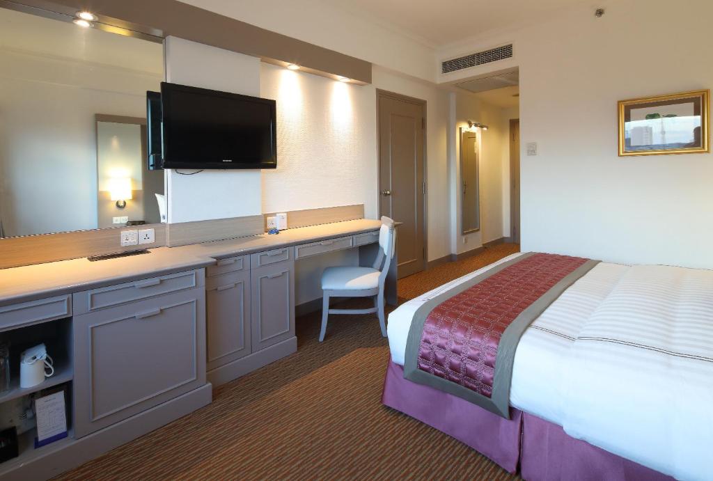 Postel nebo postele na pokoji v ubytování Sunway Hotel Hanoi