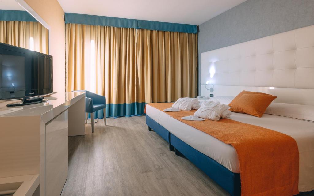 Postel nebo postele na pokoji v ubytování Hotel Viest