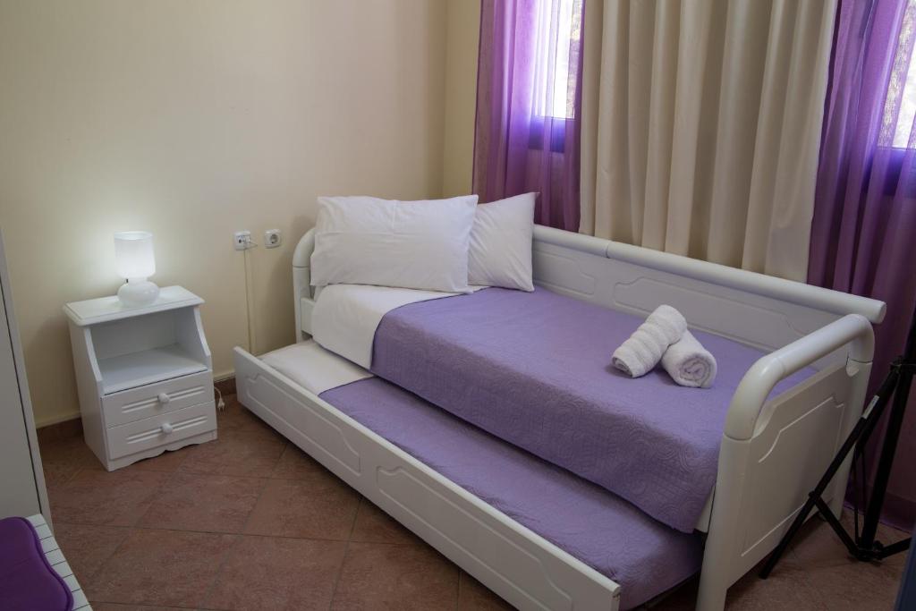 Postel nebo postele na pokoji v ubytování Villa Dome