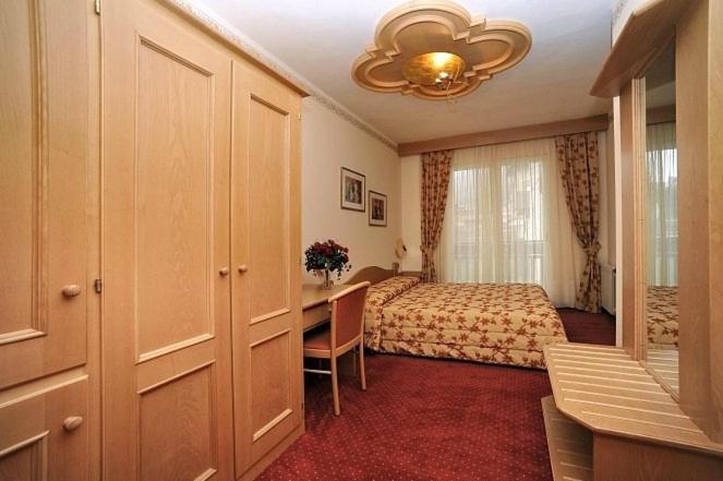 Postel nebo postele na pokoji v ubytování Hotel Europa