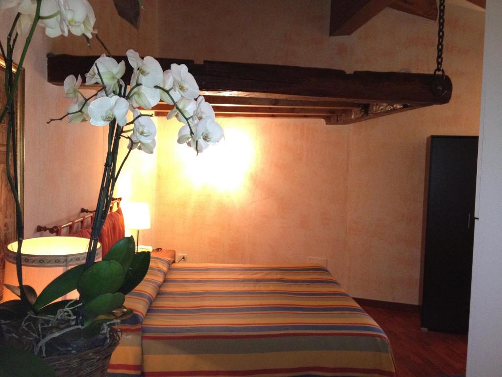 Postel nebo postele na pokoji v ubytování Intra Hotel
