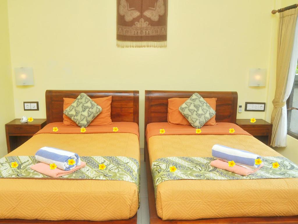 Postel nebo postele na pokoji v ubytování Bucu Guest House