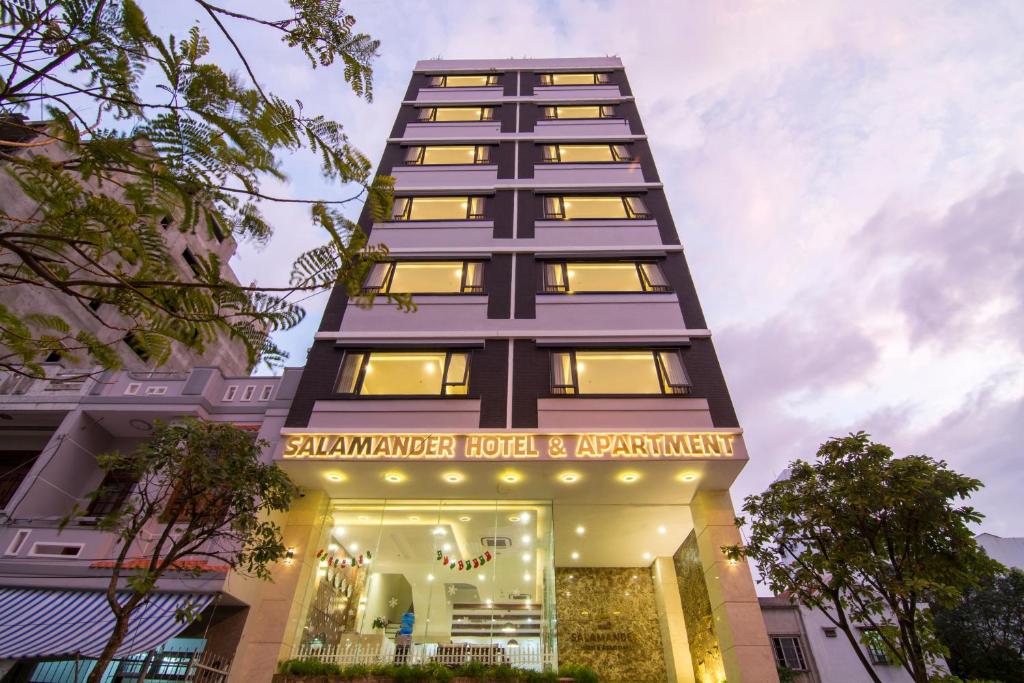 a tall building with a sign that reads sahmmer hotel and apartment at Salamander Apartment hotel in Danang