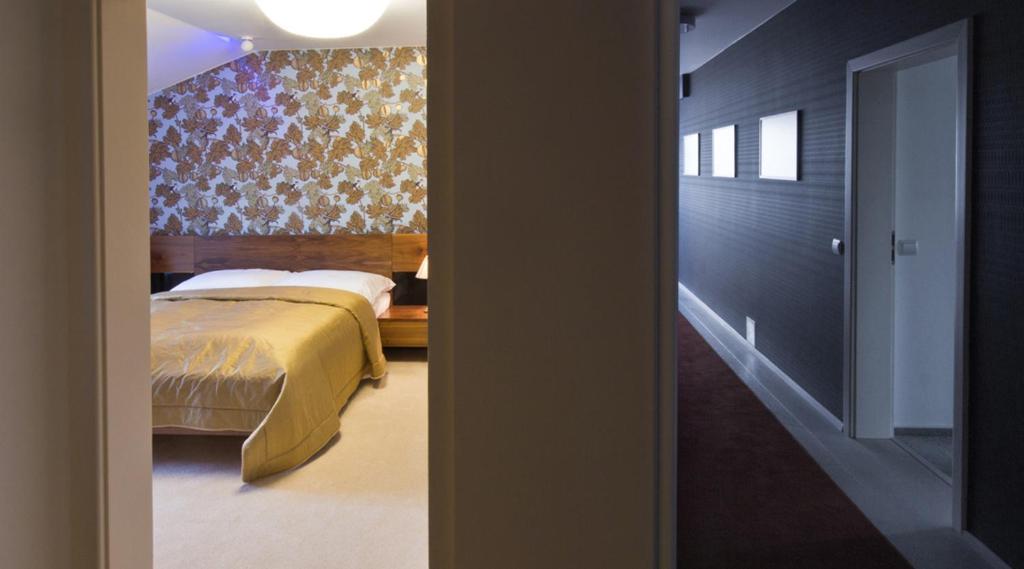 Cama o camas de una habitación en Residence Arx & Wellness