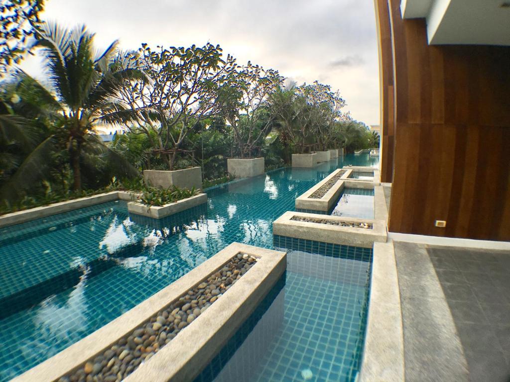 Bazén v ubytování Mida de Sea Residence Hua Hin nebo v jeho okolí