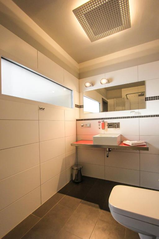 Kuchyň nebo kuchyňský kout v ubytování SOLEWERK Hotel