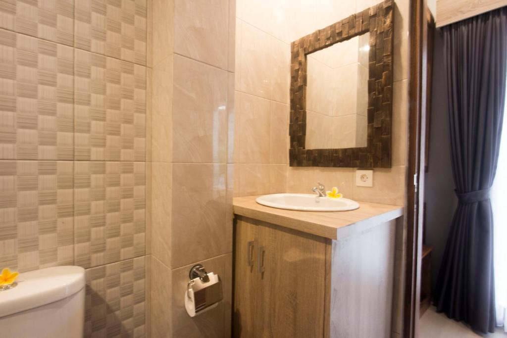 Koupelna v ubytování Nang Ade House