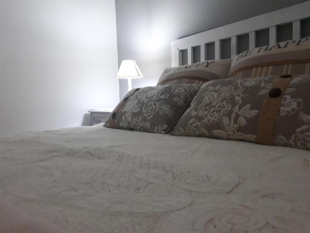 A bed or beds in a room at Piso Camino de Santiago 2