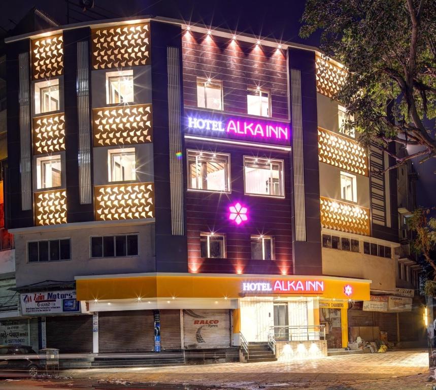 a hotel with a sign that reads hotel alkmaan at Hotel Alka Inn in Ahmedabad