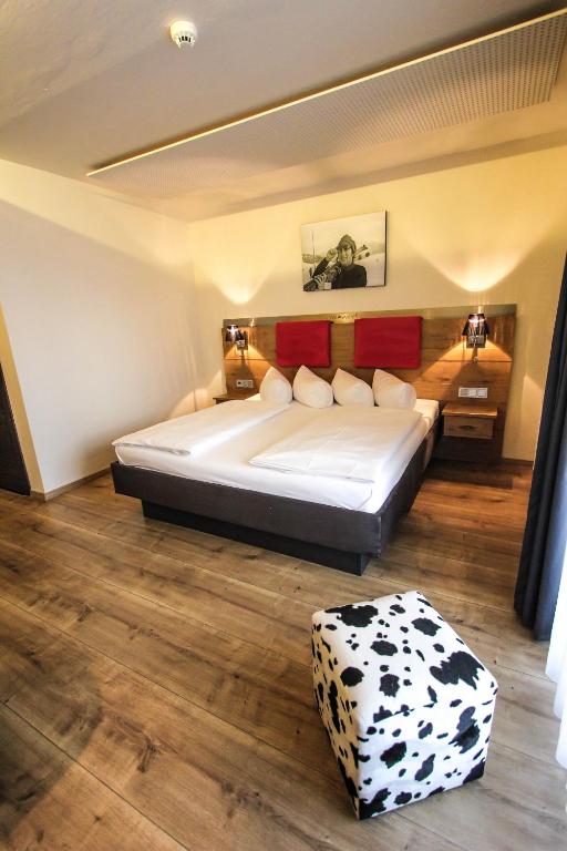 Postel nebo postele na pokoji v ubytování SOLEWERK Hotel