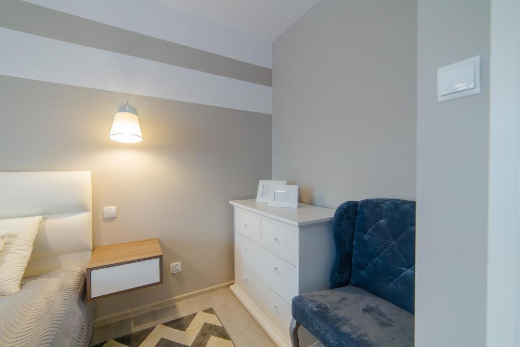 Posteľ alebo postele v izbe v ubytovaní DP Apartament Polanki Park
