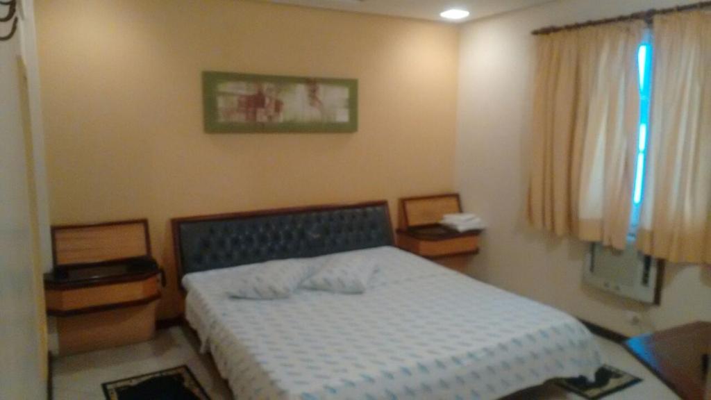 Postel nebo postele na pokoji v ubytování Golfinho Hotel (Adults Only)