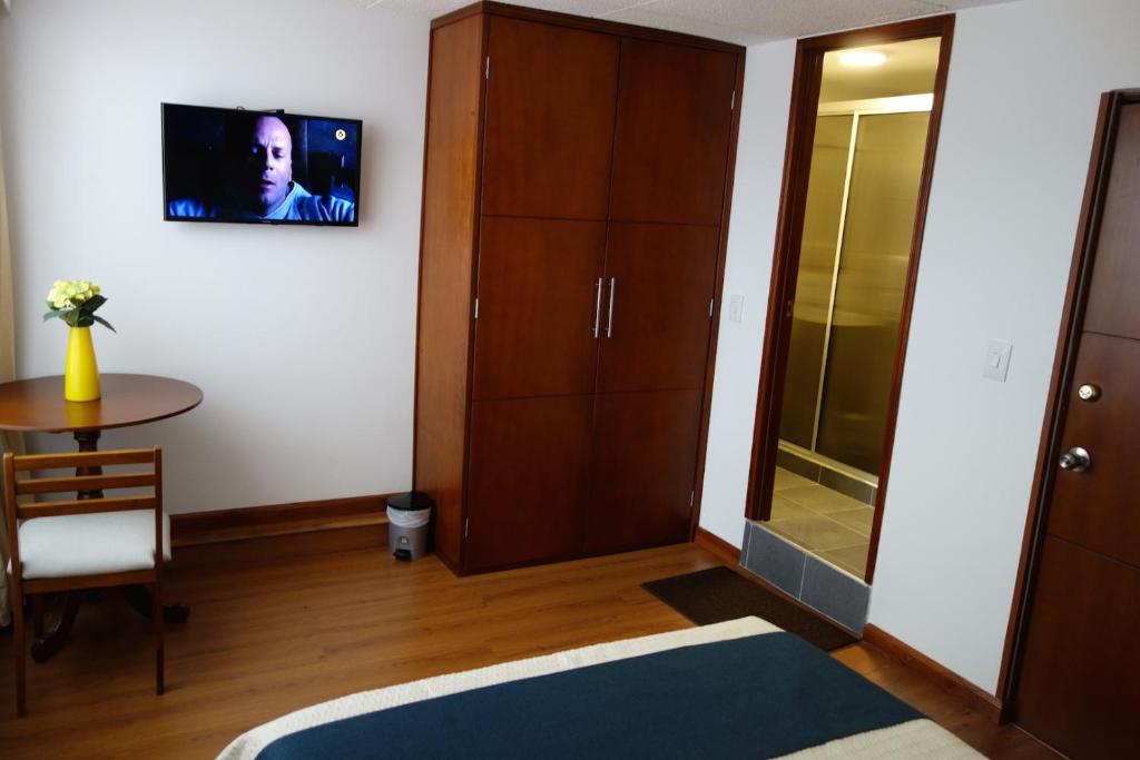 TV a/nebo společenská místnost v ubytování Hotel Maceo Chico
