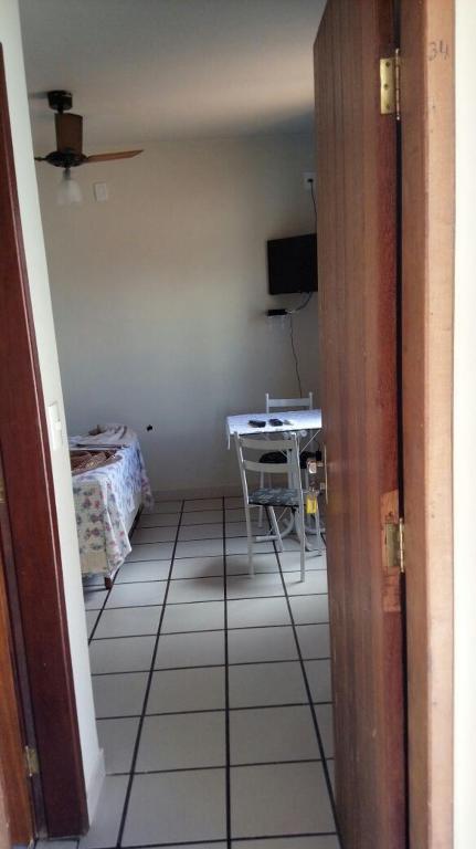 TV a/nebo společenská místnost v ubytování Quarto particular em Vitória