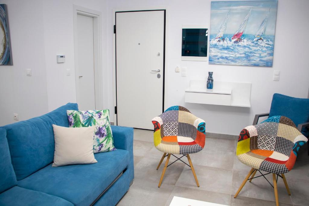 Telewizja i/lub zestaw kina domowego w obiekcie Aegean Horizon Beachfront Villas