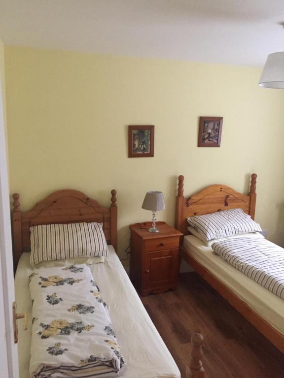 Säng eller sängar i ett rum på Ashleagh Cove
