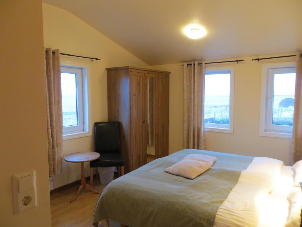 Postel nebo postele na pokoji v ubytování Guesthouse Vellir