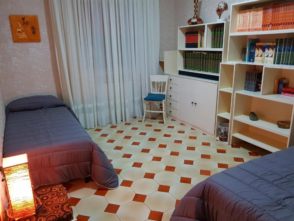 Postel nebo postele na pokoji v ubytování Catania house Apartment