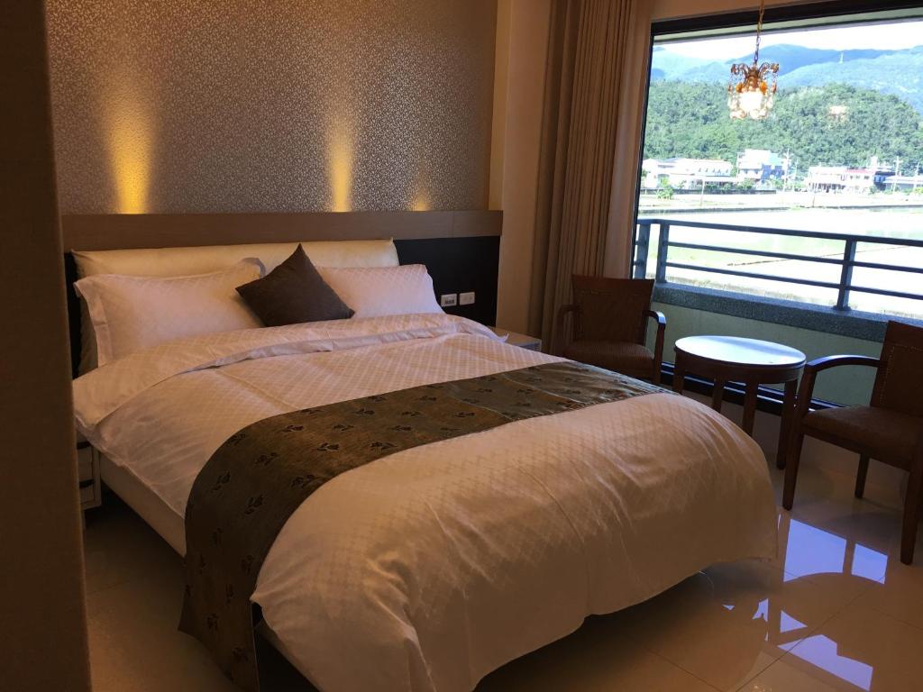 Postel nebo postele na pokoji v ubytování Lan Tian Homestay