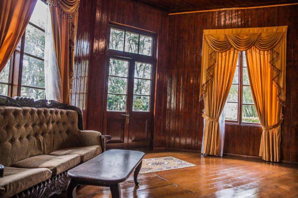 Posezení v ubytování Royal Majesty Bungalow