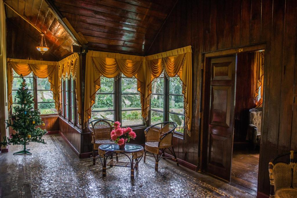 Posezení v ubytování Royal Majesty Bungalow