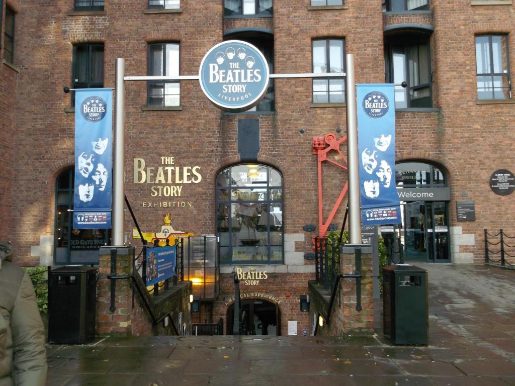 a building with a sign that reads the beets store at The Captains House in Liverpool