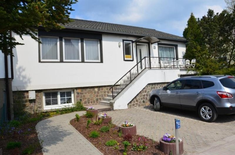 a car parked in front of a house at Fewo Tulpe in Zinnowitz