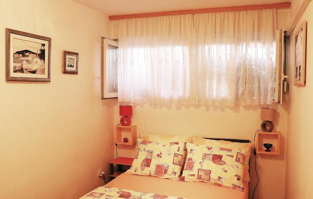 Postel nebo postele na pokoji v ubytování Rooms Alijev