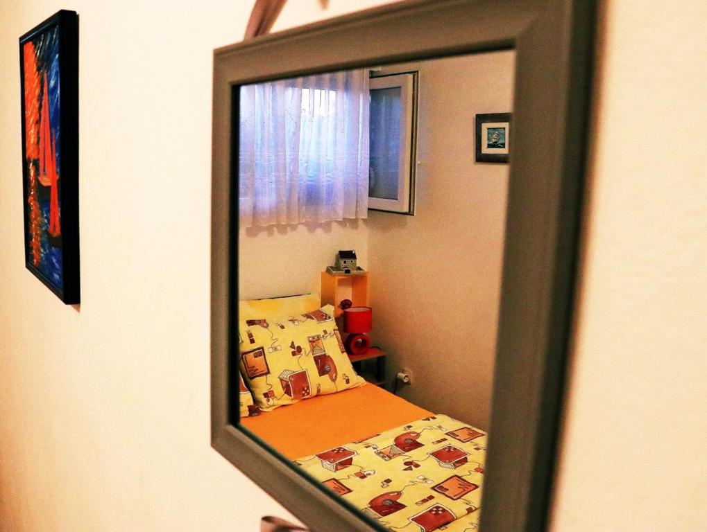 Postel nebo postele na pokoji v ubytování Rooms Alijev