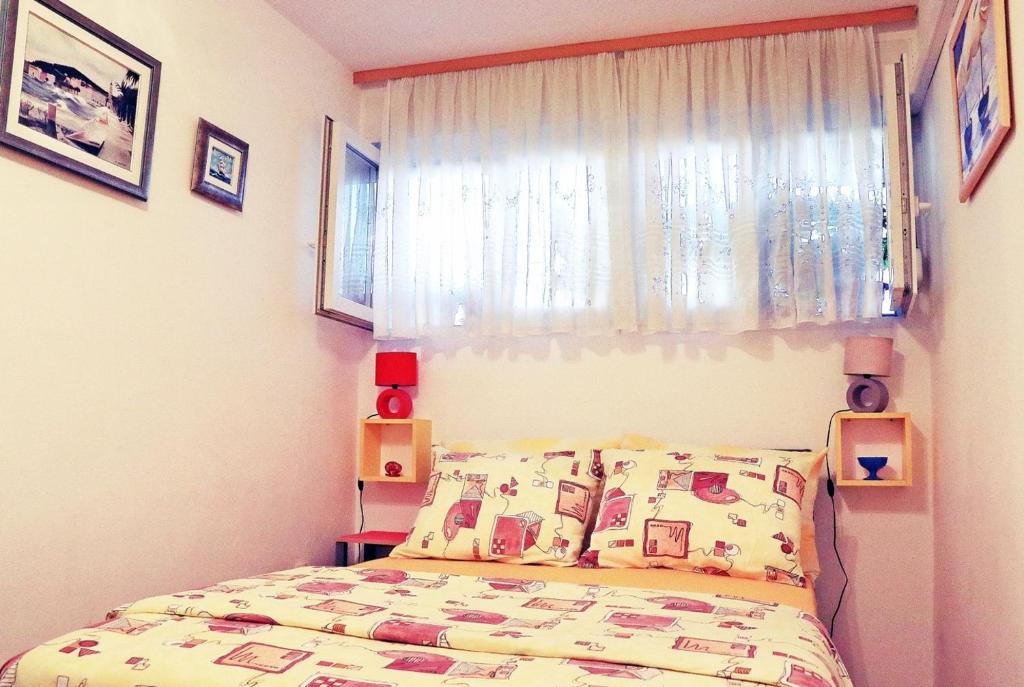 Postel nebo postele na pokoji v ubytování Rooms Alijev