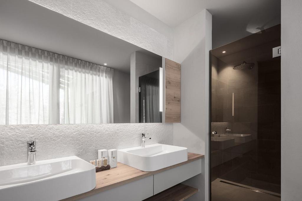 Koupelna v ubytování Hotel Ciasa Salares
