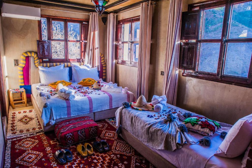Postel nebo postele na pokoji v ubytování Toubkal Ecolodge