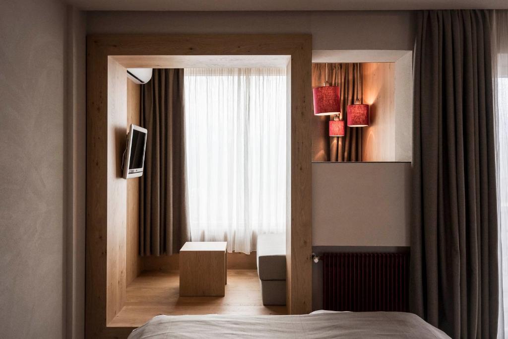 Postel nebo postele na pokoji v ubytování Das Panorama Designhotel