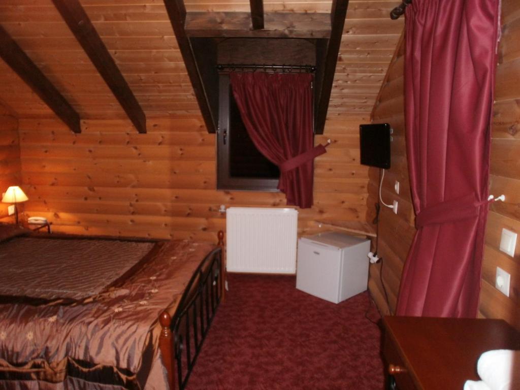 Postel nebo postele na pokoji v ubytování Stivakti Chalet