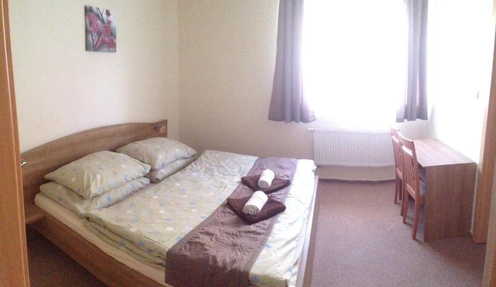 Letto o letti in una camera di Guest house Fleurs