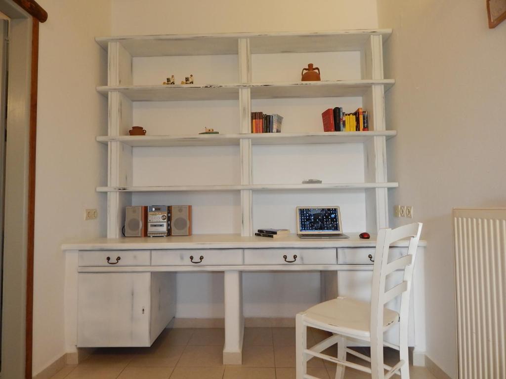 Kuchyň nebo kuchyňský kout v ubytování Paros Apartments