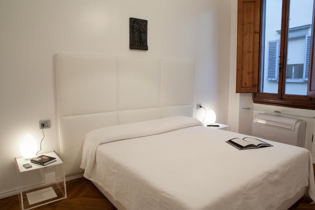 Posteľ alebo postele v izbe v ubytovaní Suite Deluxe Florence