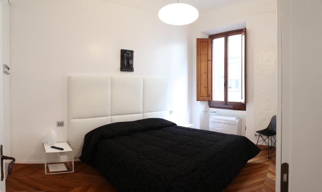 Posteľ alebo postele v izbe v ubytovaní Suite Deluxe Florence