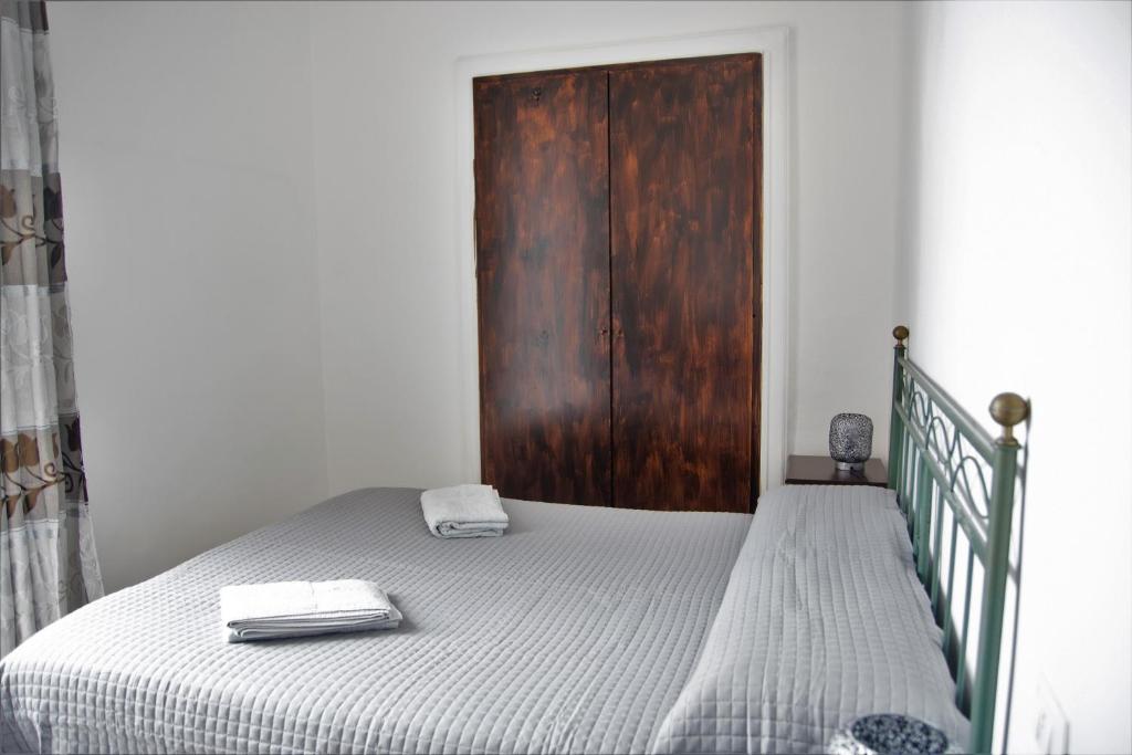 Postel nebo postele na pokoji v ubytování Aloha House