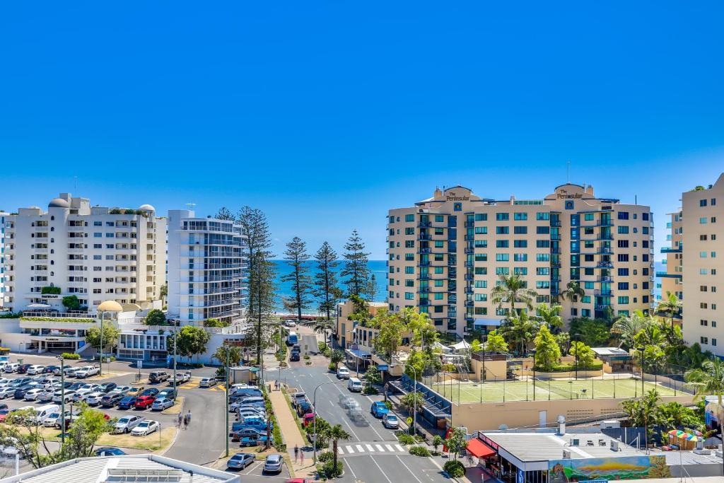 an aerial view of a city with tall buildings at Direct Collective - Sea Breeze Mooloolaba in Mooloolaba
