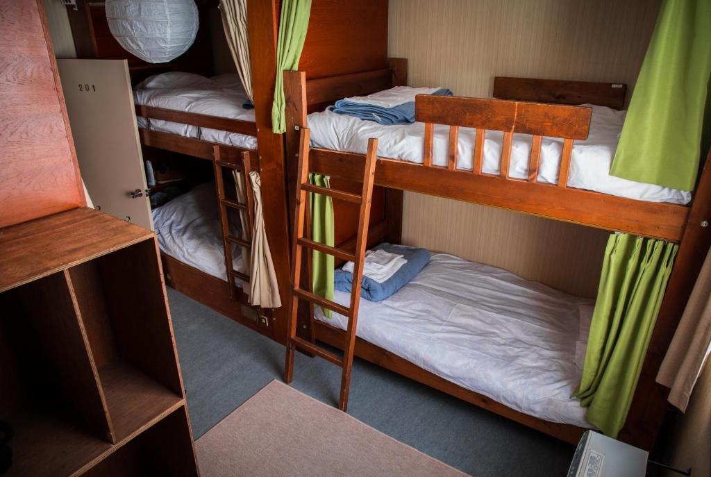 Postel nebo postele na pokoji v ubytování Annupuri Oasis Lodge