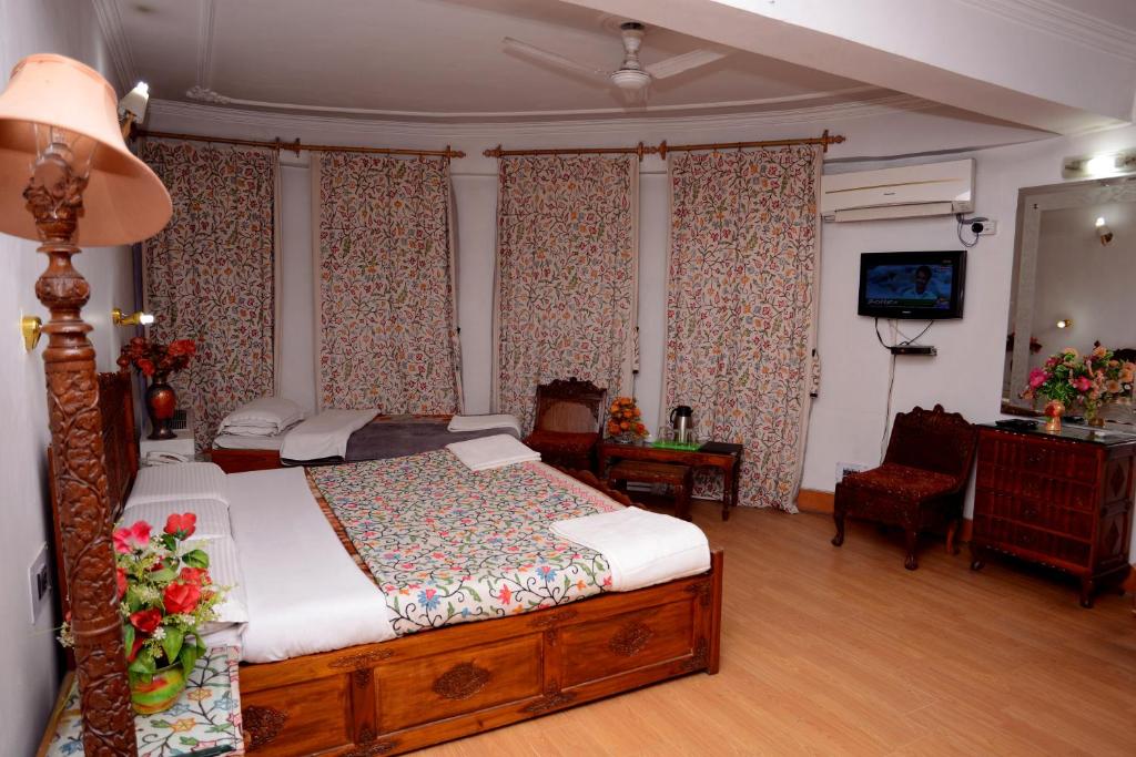Postel nebo postele na pokoji v ubytování Hotel Centre Point
