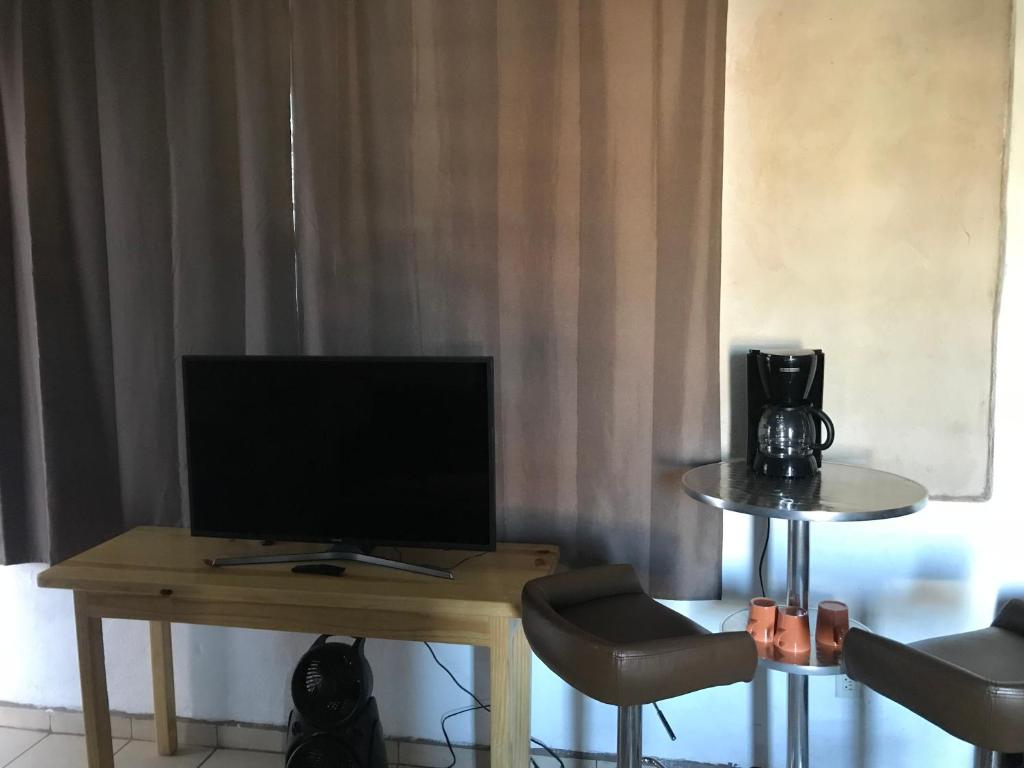 TV a/nebo společenská místnost v ubytování Las Enredaderas